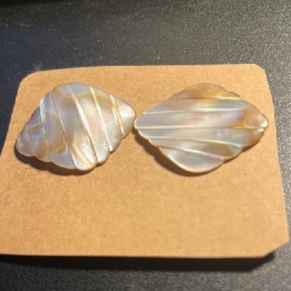 this is a pair of carved mother of  pearl shell EARRING CLIP